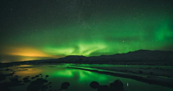 Aurora Borealis dancing over Kiruna, Swedish Lapland - Northern Lights tour destination